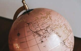 A globe on the desk for our article about practical uses for history.
