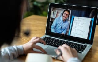 A student in an online remote classroom who enrolled mid-year through a rolling admissions program.