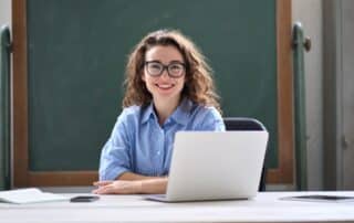 Teacher and students in a small online class at Tenney School Live, focused on personalized learning and student success.